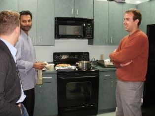 90.7s Mark Simpson and guests gather in the kitchen before show